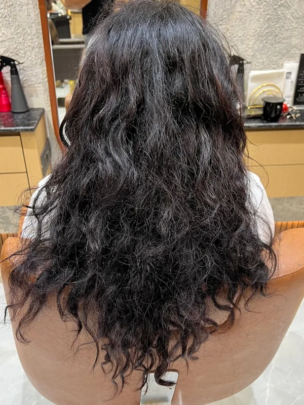 Before Nanoplastia — frizzy curly hair client at L'Amour Luxe Kharghar